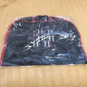 Carolina Herrera suit holder